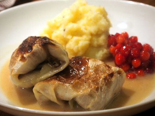 Smorrebrod Cabbage Roll “Kåldolmar” served with Mash Potatoes, creamy brown sauce and Lingonberry jam